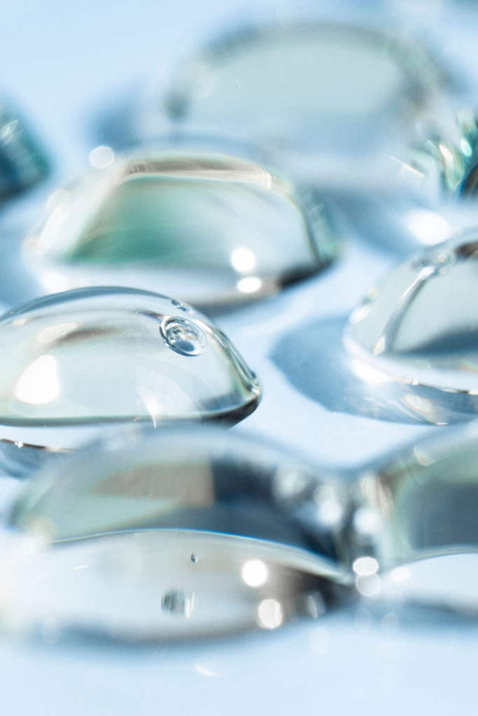 transparent-drops-with-bubbles-on-a-blue-backgroun-2023-04-10-23-41-52-utc.jpg